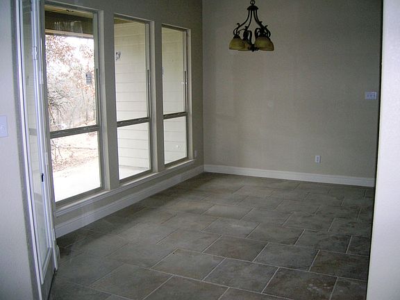 sunny breakfast area with view of natural surroundings