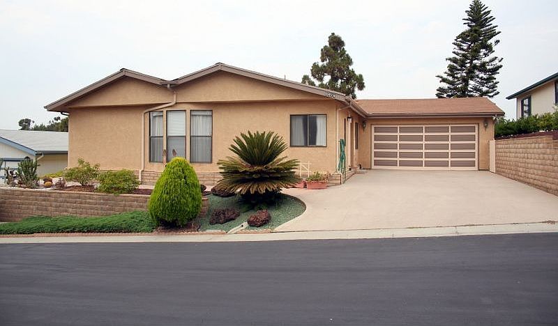 Front View (hard to find stucco and attached 2 car garage)