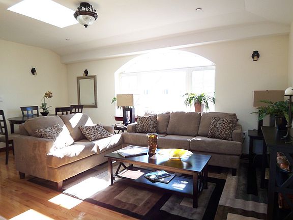 Elegant Living Room with Skylights
