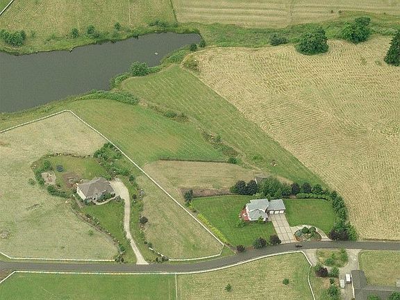 Over 5 acres on large shared pond