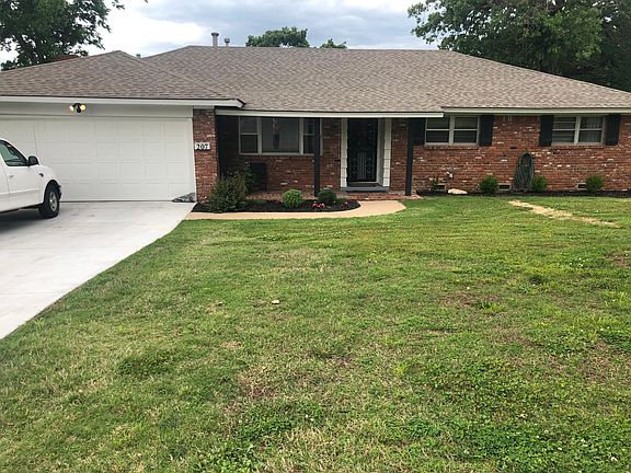 Front south facing with covered porch