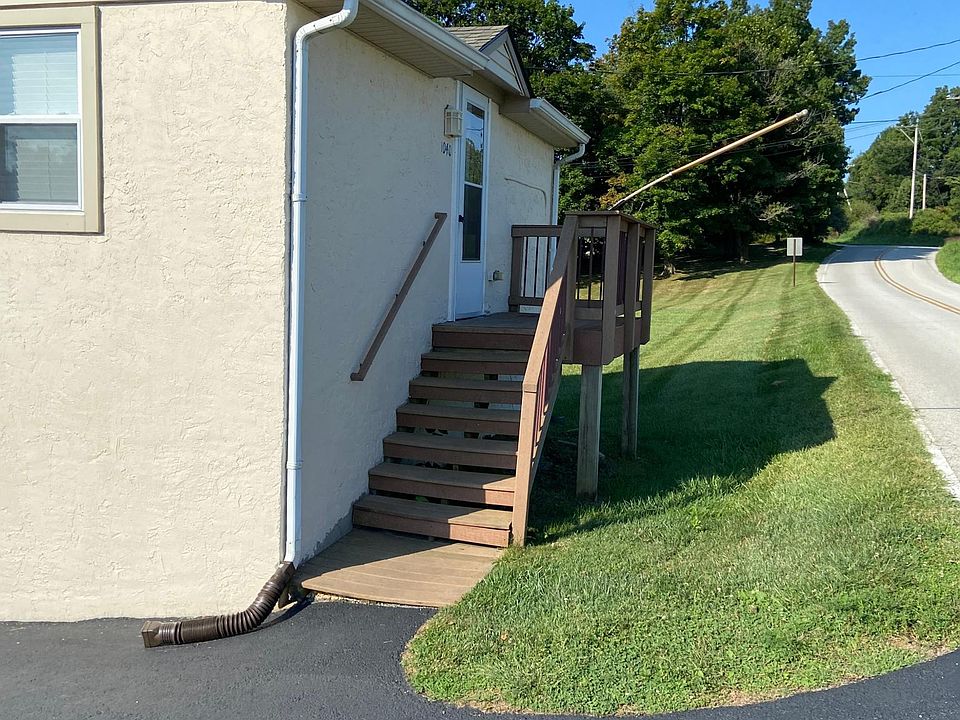 Front door for apartment located at top of deck