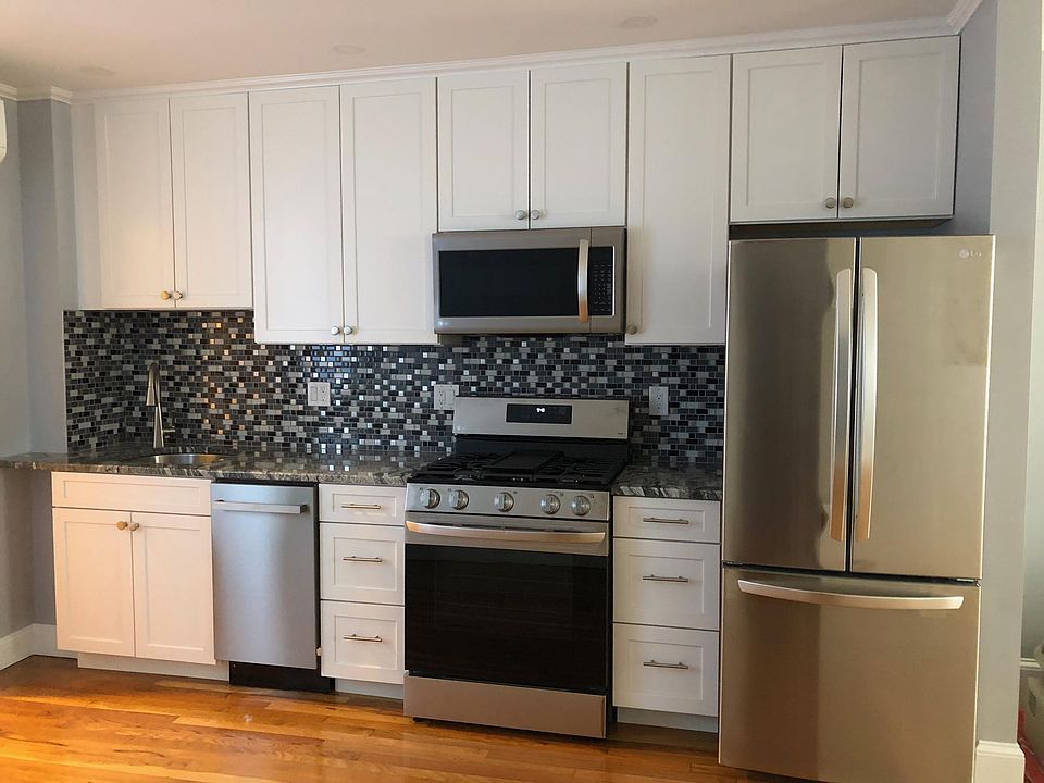 High end kitchen with gas stove, garbage disposal, ice maker, dishwasher and much more. Everything you need to move in including; table service for 8, pots, pans and cooking utensils.