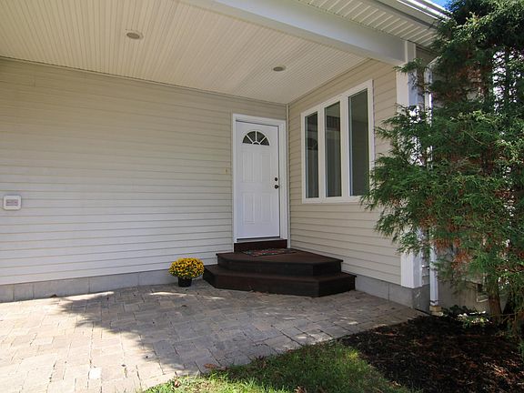 Private Covered Stone Patio Entrance