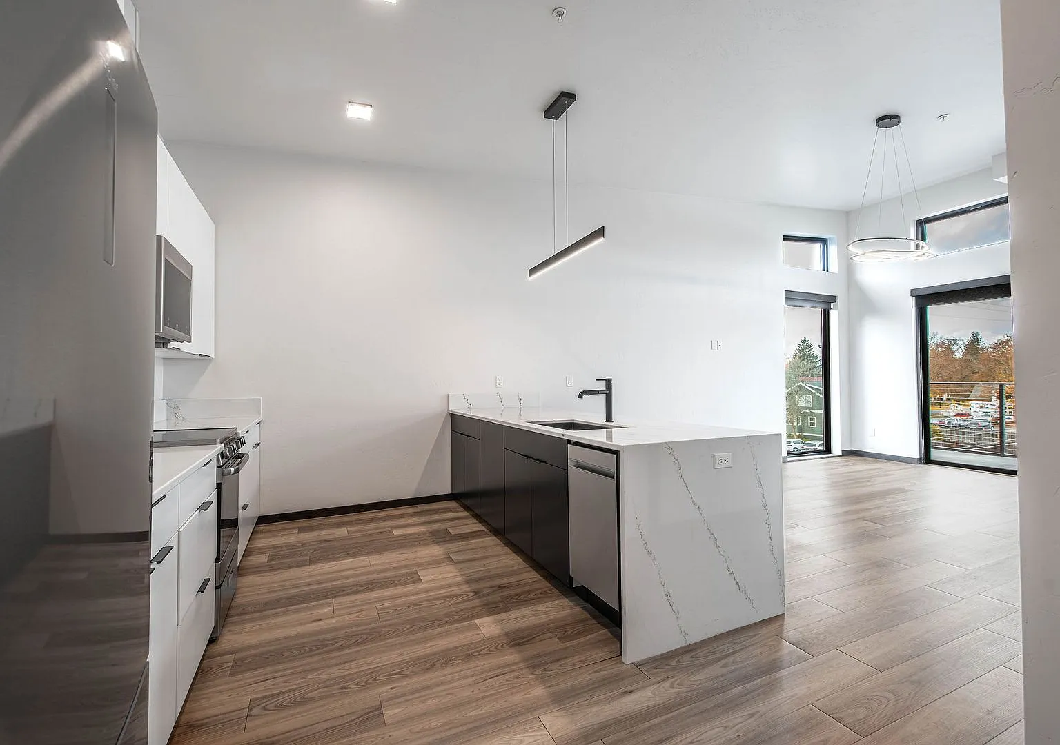 Perfect Corner Unit | 1 Bed, 1 Bath + Private Deck in Midtown CDA — Photo 1