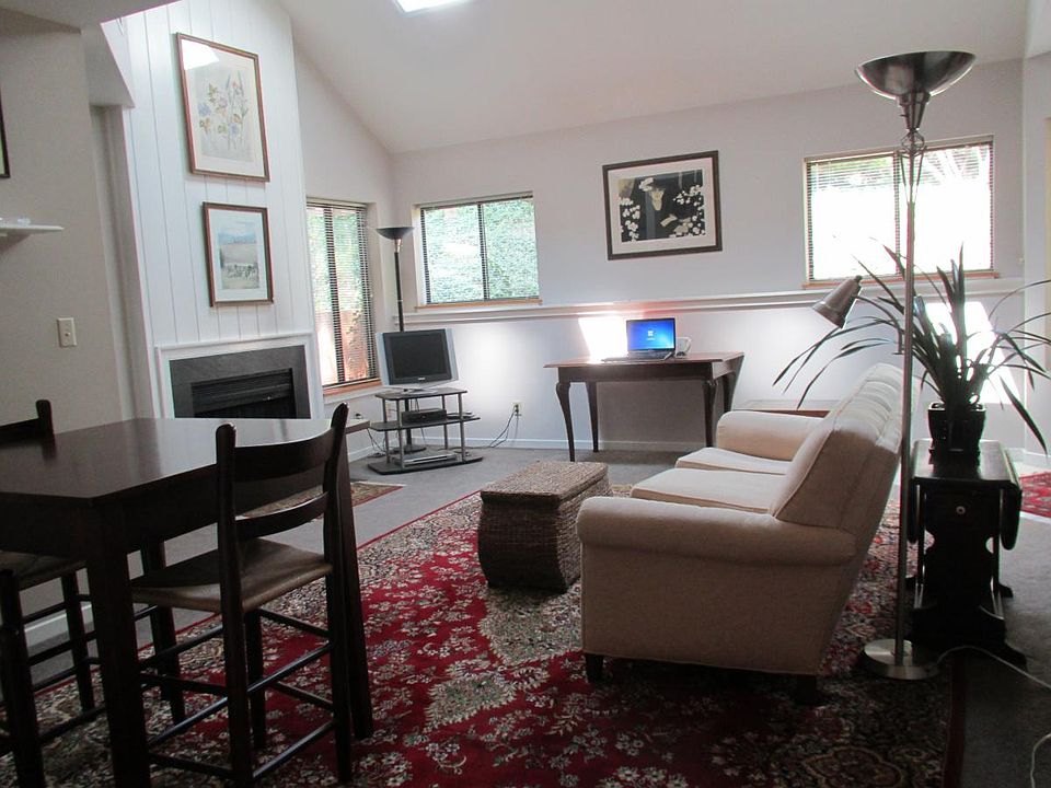 Living Room with Cathedral Ceiling and working fireplace