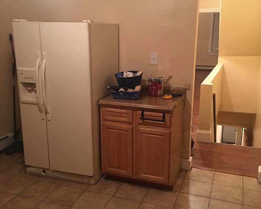 Spacious eat-in kitchen with updated appliances and plenty of counter space.
