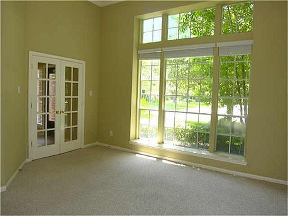 Large Study w/French Doors to Foyer & private access to Full Bath. High Ceilings, Crown Molding.