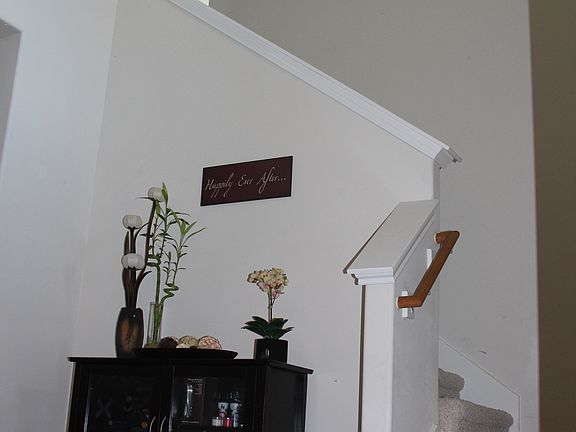 Stunning two story open tiled entry!