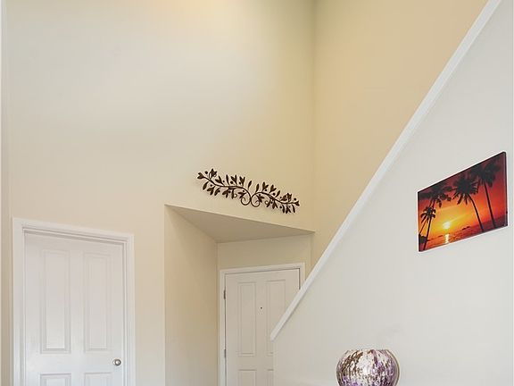 View looking toward the front door and office.