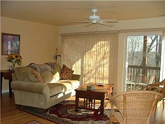 Open Floor Plan - Living Room w/ Sliders to Deck