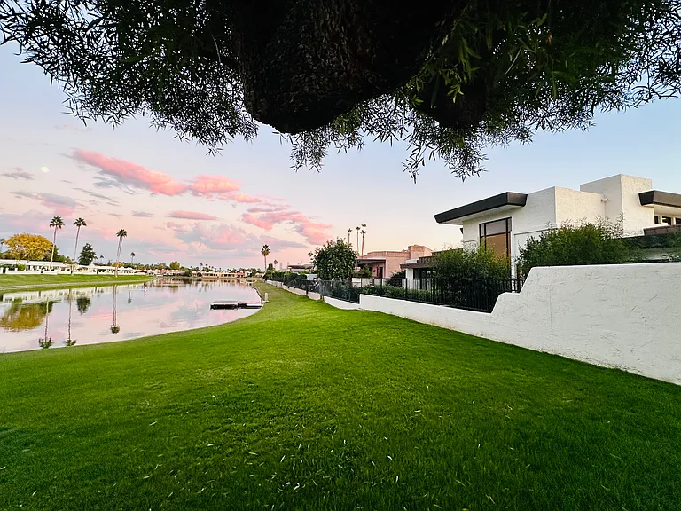 Back of the house with the stunning lake view .