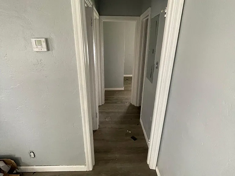 hallway to the three bedrooms and the full bathroom