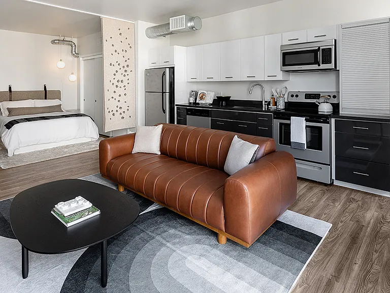 Griffis East Village Reno Model Living Room and Kitchen and Bedroom
