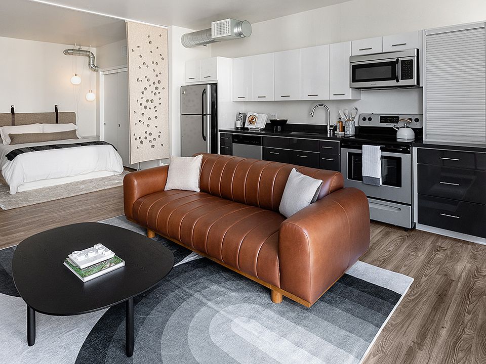 Griffis East Village Reno Model Living Room and Kitchen and Bedroom