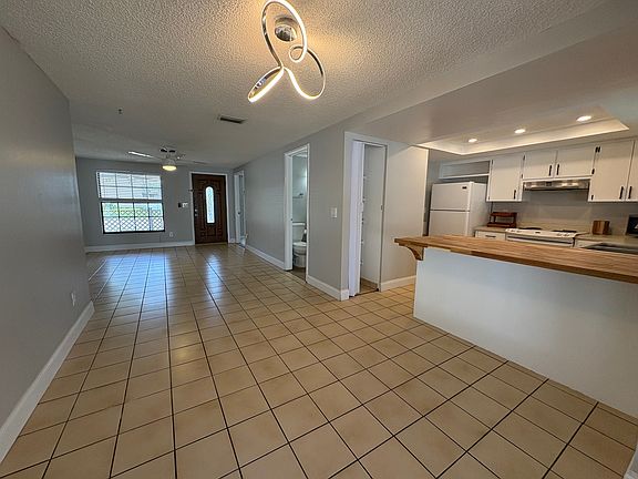 entry, living room and open floor plan