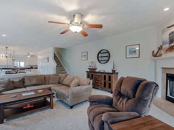 Cozy up to the fireplace and enjoy plenty of comfortable seating!