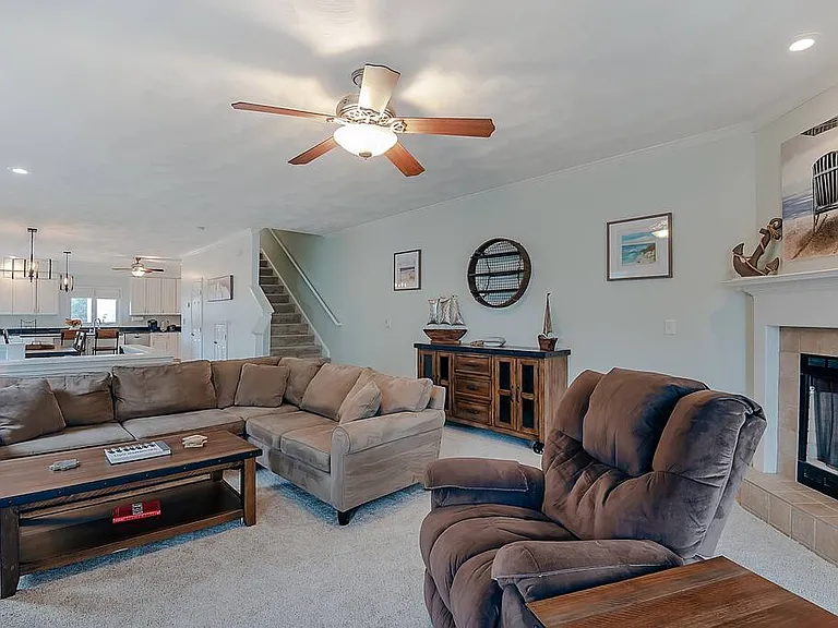 Cozy up to the fireplace and enjoy plenty of comfortable seating!
