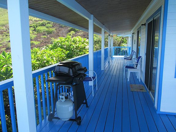 The north facing wrap-around lanai; barbeque cooking area.