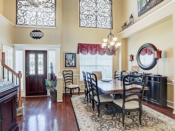Great view of the entrance and the formal dining room.