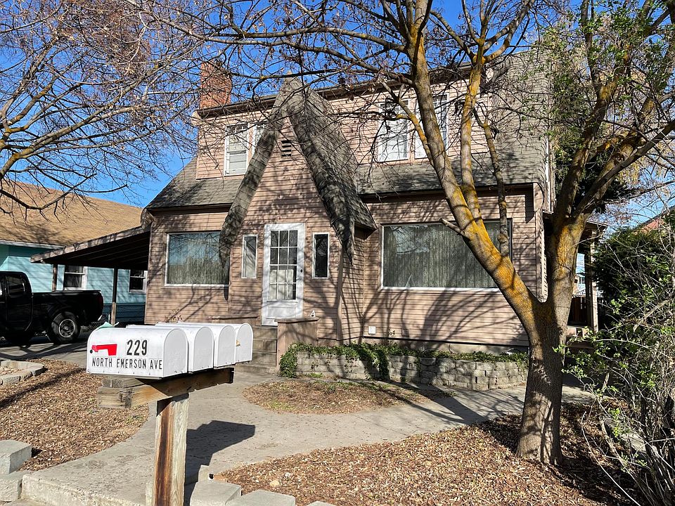 Front of House with Door and Mailboxes