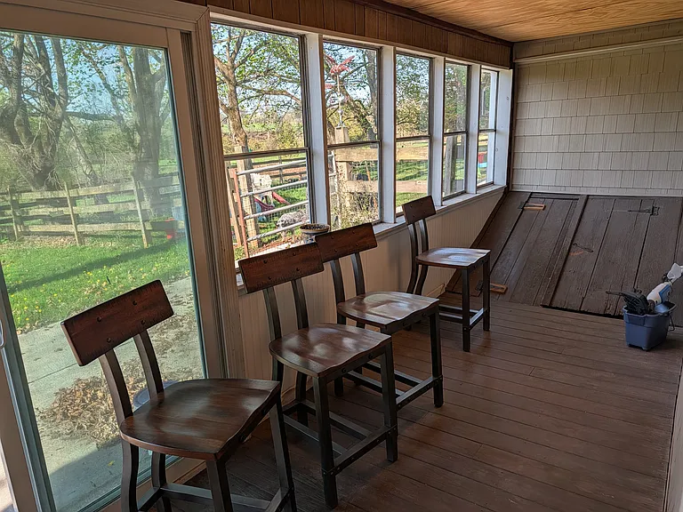 Sun Porch with access to basement