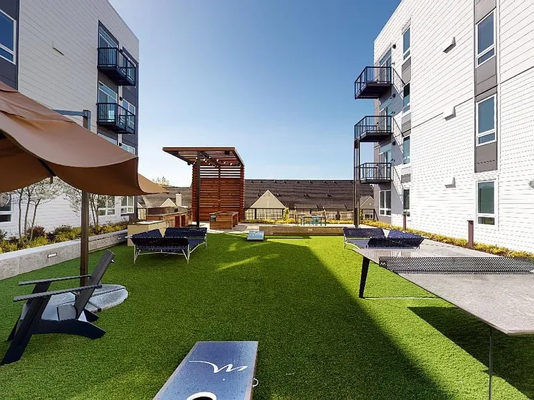 Relax in the landscaped courtyard or play a game of cornhole