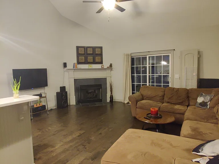 Open living room, kitchen with laundry room and half bath off the side