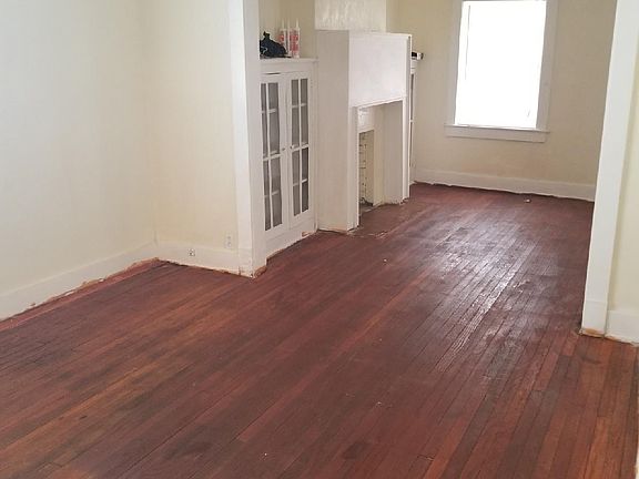 Hardwood in living room, dining room and bedrooms