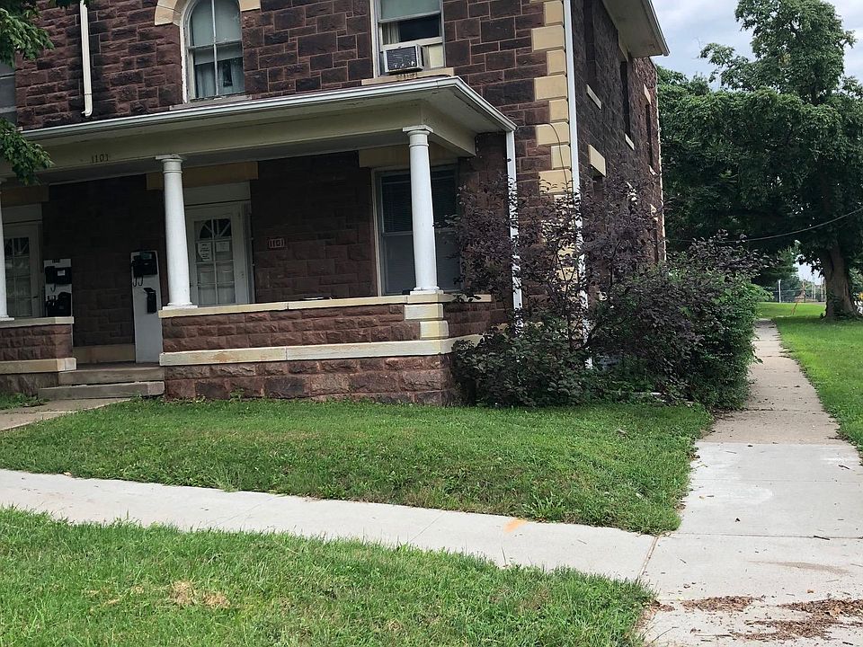 Front of the all brick building
