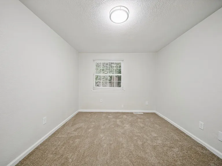 Third Bedroom Window (backyard view left side)