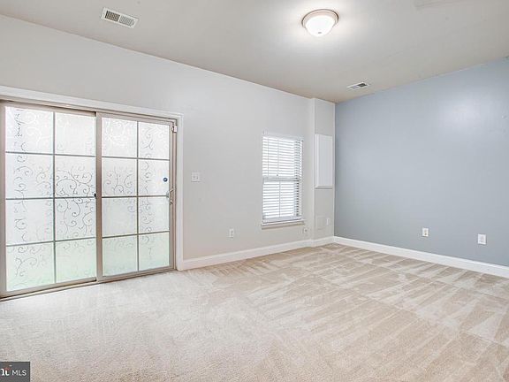 Large rec room with slider out to the backyard