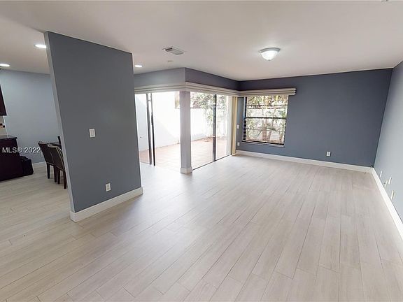 Eat-in kitchen, plus large living room/dining room. Flows to lovely tiled patio.