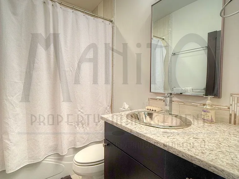 947 E 32nd Ave — Photo 13