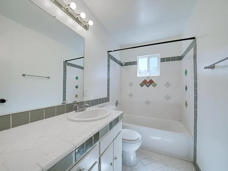 Bath 2. Unique tile designs.