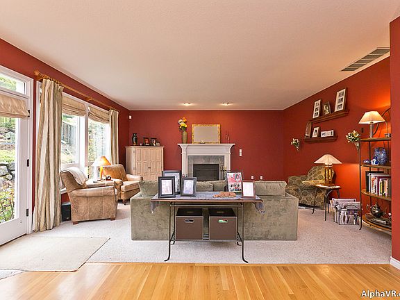 Large family room is next to the kitchen and opens to the patio and backyard.