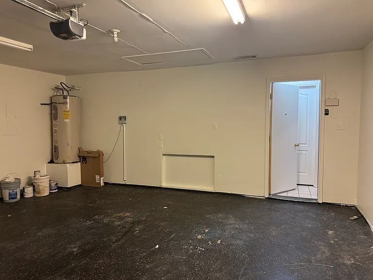 Garage with room for storage.