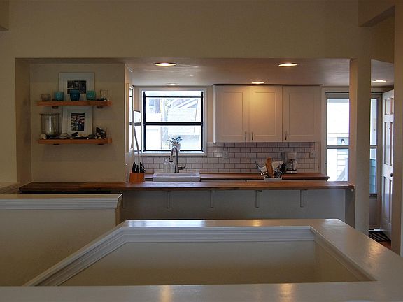 Main floor kitchen, dining and sitting room all open to one 