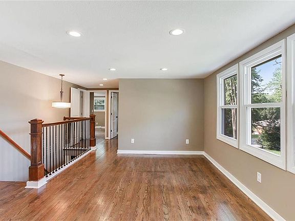 Enter into the spacious living room with beautiful hardwood floor and large windows to let in light. Three bedrooms and 1 full bath on the main level. Fourth non-conforming bedroom and second full bathroom are in lower level.