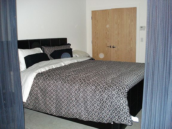 Designer steel 'curtain' segments bedroom 