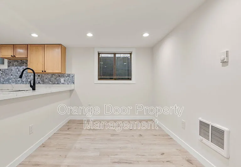 7727 Jones Ave NW — Photo 17
