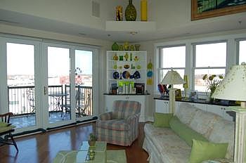 Enjoy the light and bright living room with entry to balcony from the Living room.