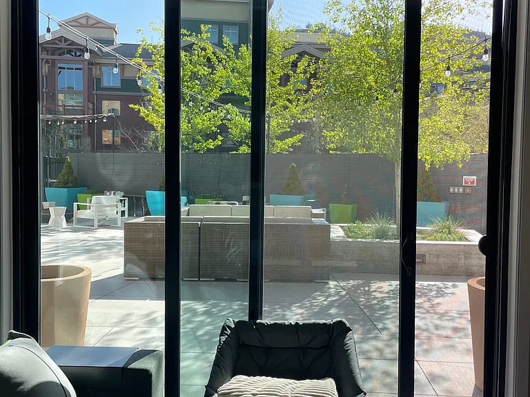 __ View from the window to the backyard
__ Open the window and step right into the backyard to relax. Enjoy direct access to the pool, hot tub, and peaceful outdoor space, perfect for unwinding after a day of adventure.