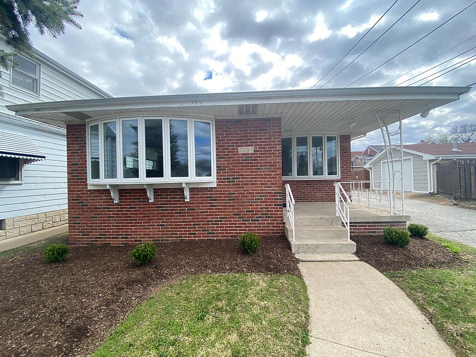 Front yard with bay window and lots of natural light!