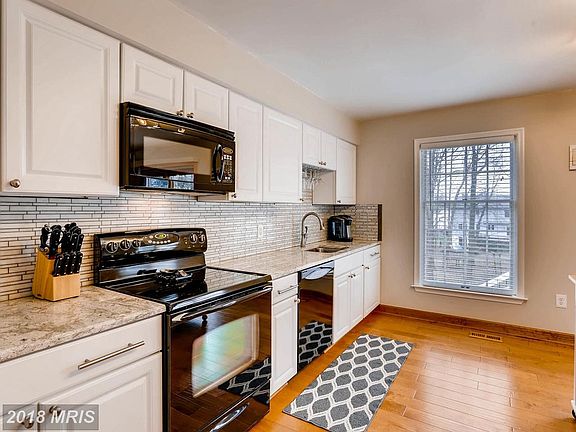 Granite Counters, Upgraded Finishes, HW flooring