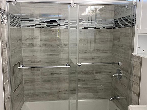 All new bathroom with Italian tile and custom glass enclosure