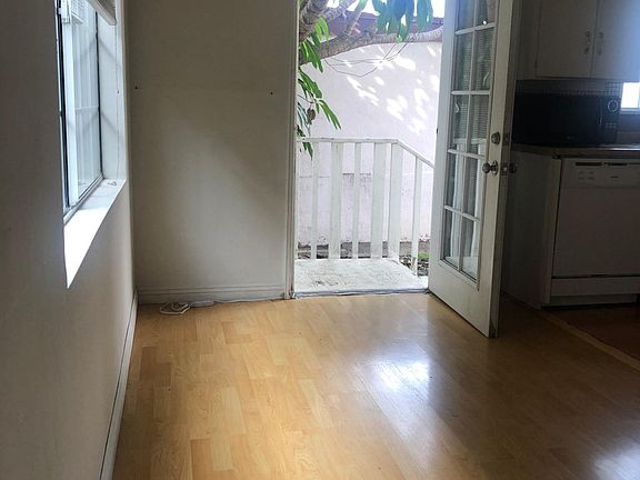Dining area with rear door to yard