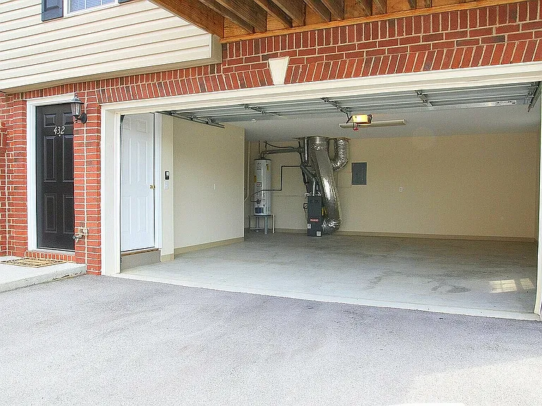 Attached 2 car garage with most 3 bedroom townhomes.