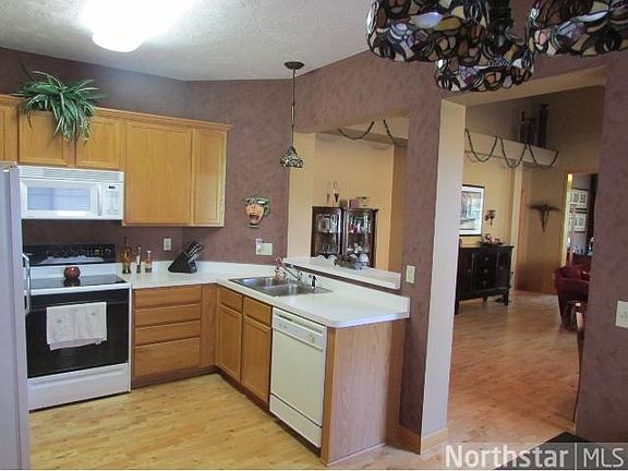 Large pass through in the kitchen connects it to the great r