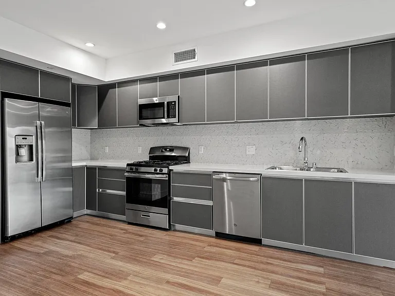 Kitchen with Stainless Steel Appliances and Ample Cabinet Storage